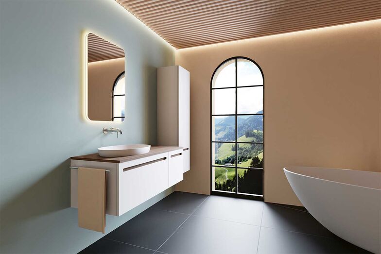 Das Badmöbel «Amana» schafft stilvolle Akzente im Badezimmer. Die Abdeckung ist wahlweise in edlem Nussbaumholz oder klassischer Eiche erhältlich. Die integrierten Griffmulden sind passend aus dem jeweiligen Massivholz gefertigt. Das durchgängige Materialkonzept sorgt für ein stimmiges Gesamtbild und unterstreicht die sorgfältige Gestaltung bis ins kleinste Detail. Loosli Badmöbel AG, www.loosli.swiss